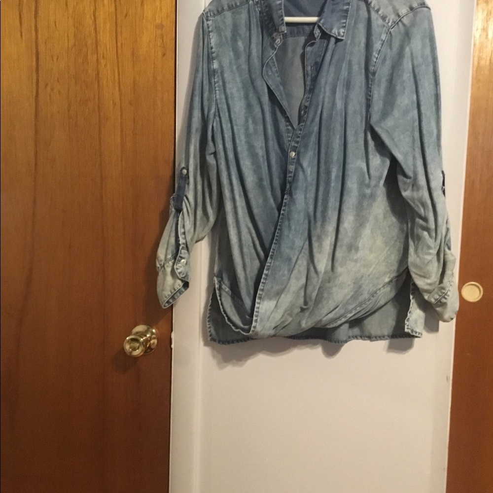 Women’s long sleeve denim blouse.